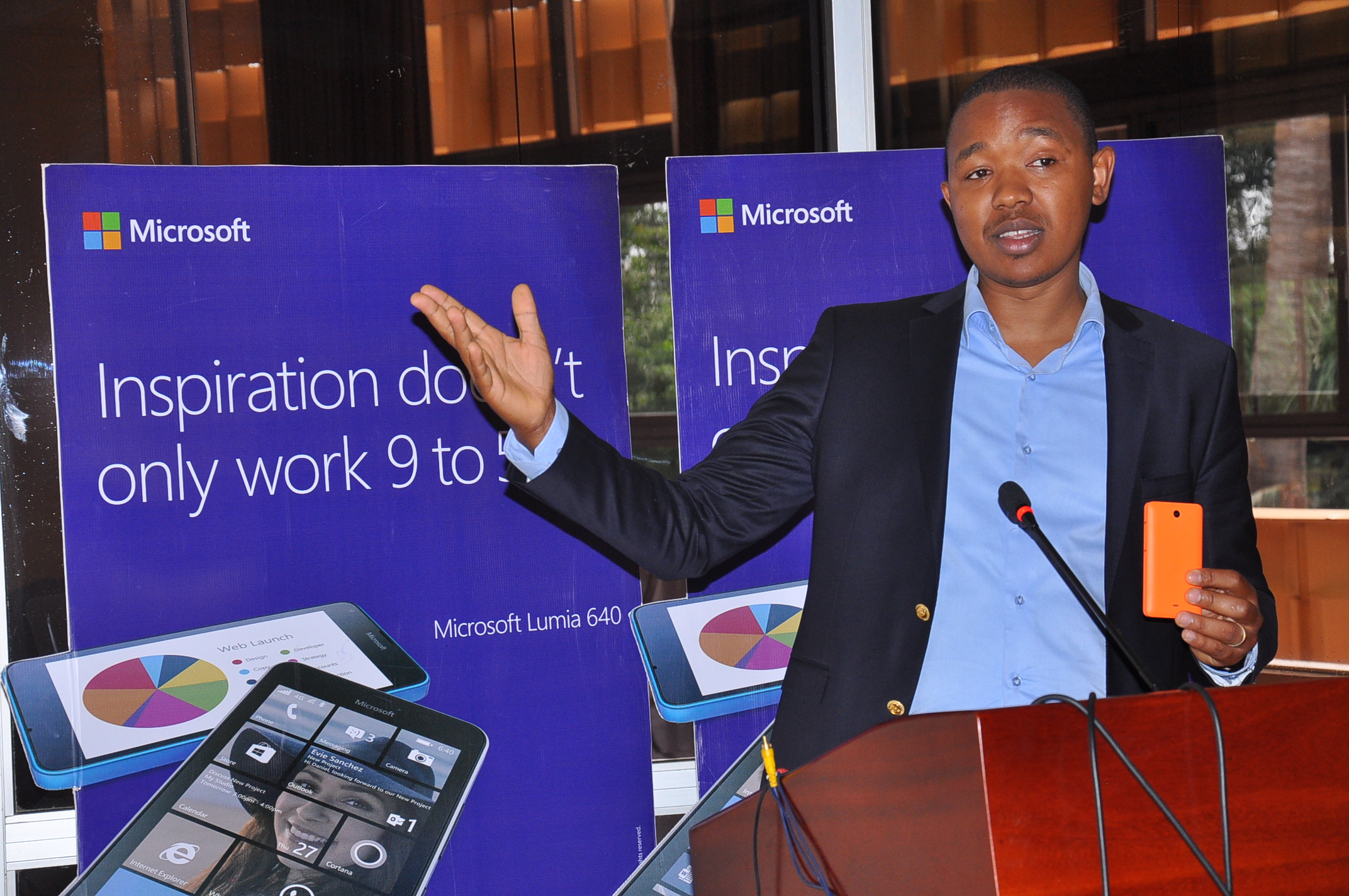 Kingori Gitahi, the Product Manager for Microsoft East Africa gestures ...