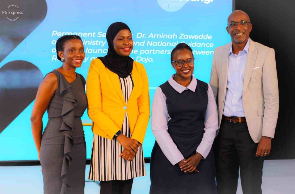 Dr. Aminah Zawedde (in yellow jacket) with Program Director Refactory Program, Michael Niyitegeka (extreme right) and Coding Dojo officials at the launch of the partnership. The Ministry of ICT is working with Refactory and Coding Dojo to support up to 10,000 technology engineers and software developers to get more software development skills.