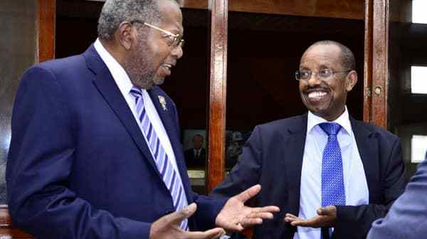 In this undated photo, former Bank of Uganda Governor, Prof. Tumusiime Emmanuel Mutebile (left) is seen with Keith Muhakanizi. The duo, together with the late Christopher Kassami, whom Muhakanizi replaced as PSST have been hailed as the major architects of Uganda's Uganda's economic growth of the early 2000s.