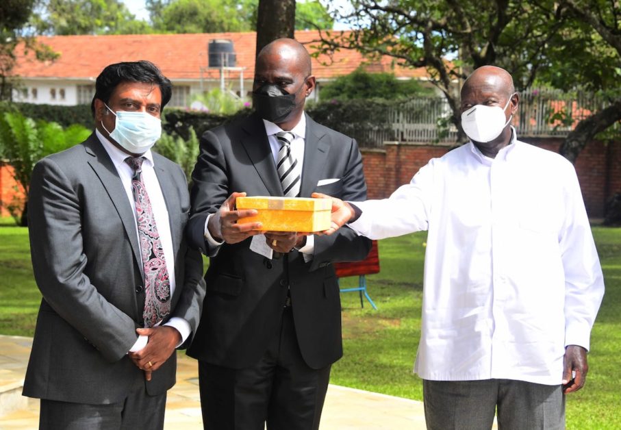 Segun Ogunsanya, the Airtel Africa Group Chief Executive Officer (centre), presents a gift to Uganda's President, Yoweri Kaguta Museveni (right) during his recent visit to Uganda. On the left is Manoj Murali, Managing Director, Airtel Uganda. Segun reiterated the telco's commitment to Uganda and listing on the exchange this year, so as to enable Ugandans to benefit from the telco's prosperity.