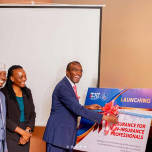 Insurance Regulatory Authority chief executive officer Ibrahim Lubega Kaddunabi and other stakeholders cut the ribbon during the launch of the Insurance Training College certificate for insurance professionals recently.