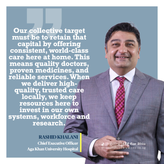 Rashid Khalani, CEO of Aga Khan University Hospital, in a grey suit with a red patterned tie, smiling confidently against a plain background. Portrait of Rashid Khalani, Chief Executive Officer of Aga Khan University Hospital, standing in a grey business suit, symbolising leadership in healthcare transformation.