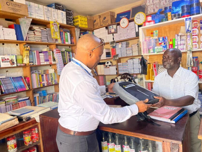 Letshego Uganda 20th Anniversary – Giles Aijukwe with partners, customers, and community members showcasing two decades of financial inclusion, affordable credit, and digital innovation for underserved markets.