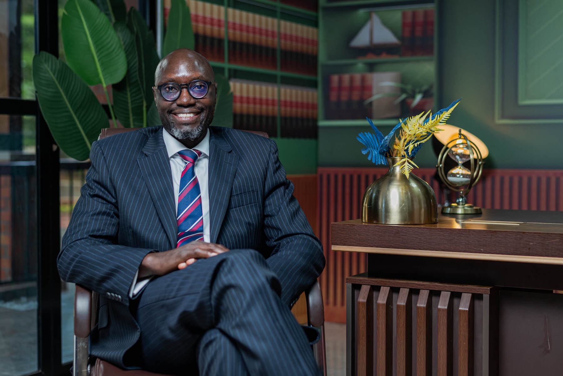 Joshua Ogwal, Partner at Ligomarc Advocates and Joint Managing Director at Rekindle Capital, photographed in Kampala, Uganda. Experienced financial lawyer and corporate governance advisor with expertise in banking, project finance, infrastructure, and natural resources law.
