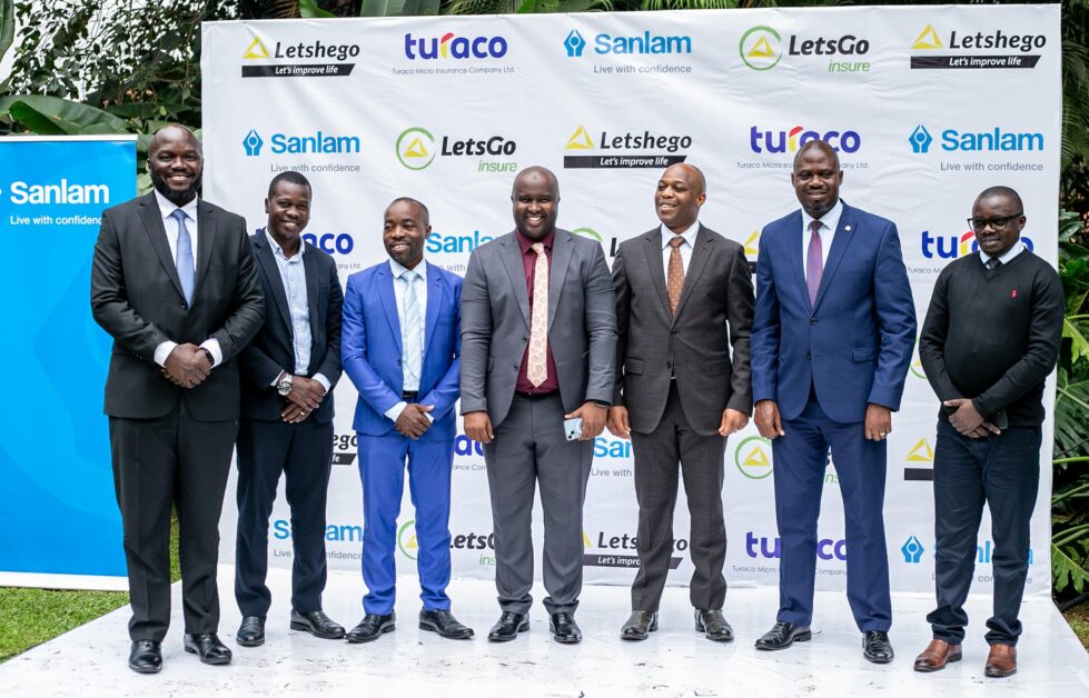 Letshego Uganda 20th Anniversary – Giles Aijukwe with partners, customers, and community members showcasing two decades of financial inclusion, affordable credit, and digital innovation for underserved markets.