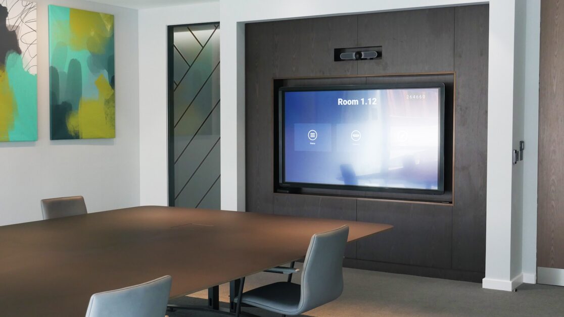 Modern African boardroom equipped with PRO AV Africa’s integrated audio-visual solutions, featuring interactive displays, video conferencing systems, wireless presentation tools, and smart room automation for seamless collaboration and high-level decision-making.
