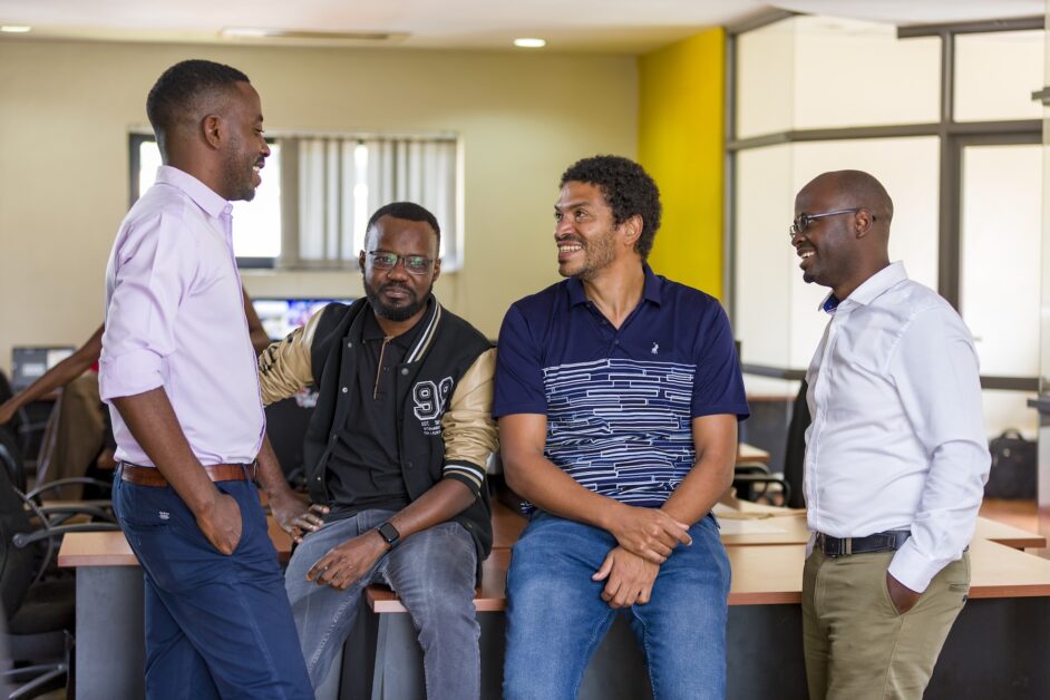 Peter Magona, Managing Director of TBWA\Uganda, in various settings including team meetings, award celebrations, and office portraits, reflecting his leadership in the advertising industry.