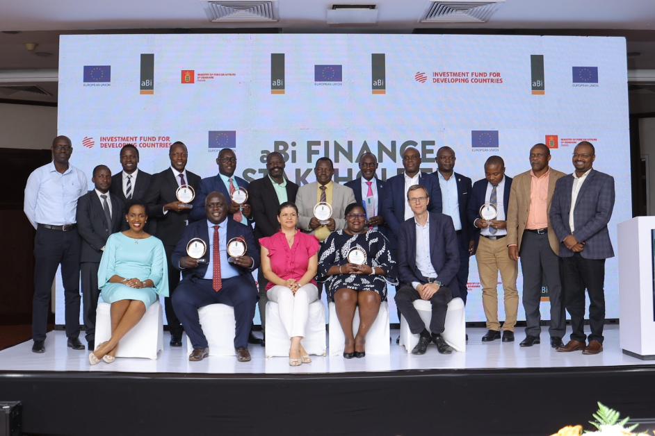 aBi Finance Limited embodies Uganda’s drive toward inclusive, green, and sustainable finance. The photo represents the institution’s decade-long impact — channeling over $175 million in financing through partner banks, microfinance institutions, and SACCOs to reach 2.2 million smallholder farmers, including 877,000 direct loan beneficiaries, 70% of whom are women. It captures the spirit of aBi Finance’s work in de-risking agriculture, strengthening governance, and building institutional capacity to make agriculture bankable. Through its guarantee mechanisms, ESG integration, and climate adaptation financing, aBi Finance has helped create 300,000 jobs and generated $154 million in community income, particularly across Northern and Eastern Uganda. The image reflects the institution’s partnerships with the EU, Denmark, the Bank of Uganda, and the Uganda Bankers Association, symbolising its role as a catalyst for green finance, inclusion, and resilience in Uganda’s financial sector.