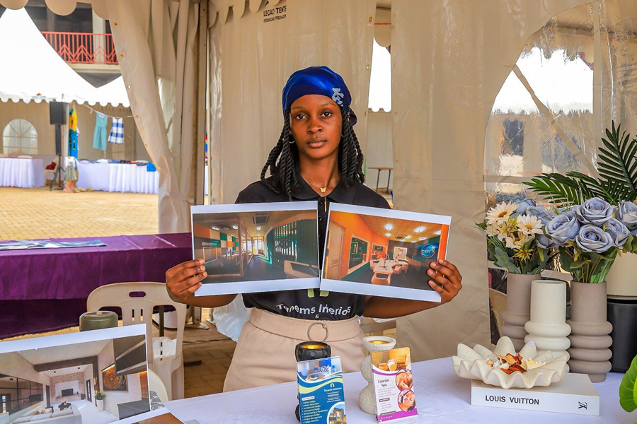 An entrepreneur showcases some of her products during the dfcu Rising Woman Expo on November 14. The expo is empowering women-led enterprises with training, mentorship, and market access, helping entrepreneurs strengthen their businesses, gain visibility, and build the skills needed to drive sustainable growth across Uganda.