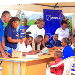 Medical officers examine patients during the recent dfcu Bank and Rotary Uganda medical health camps.