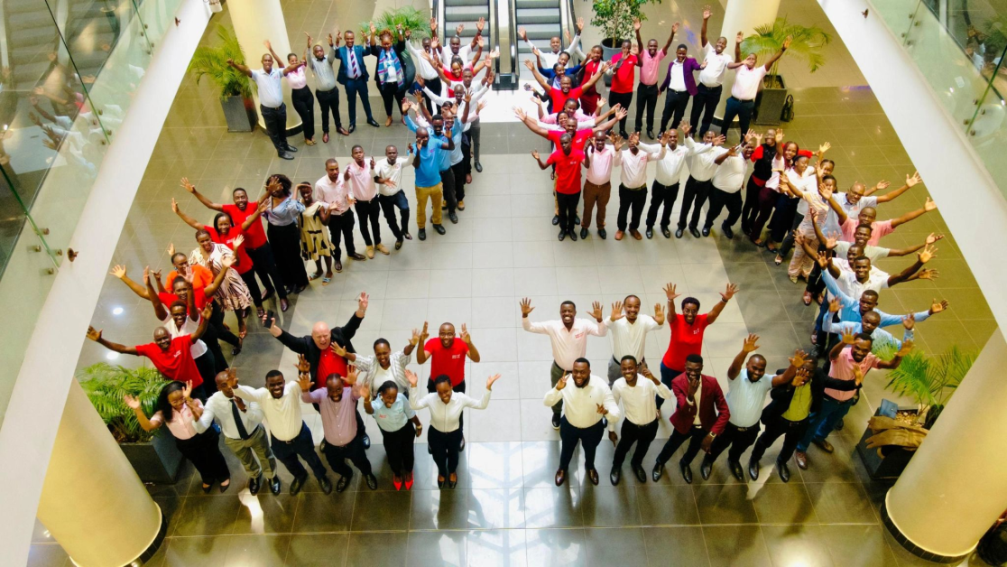 Photos from Knight Frank Uganda’s 25th Anniversary Gala featuring Judy Rugasira Kyanda, the Knight Frank Uganda Board, African regional CEOs, award recipients, long-service honorees, and staff forming a “25” to celebrate the company’s legacy, professionalism, and commitment to real estate excellence.