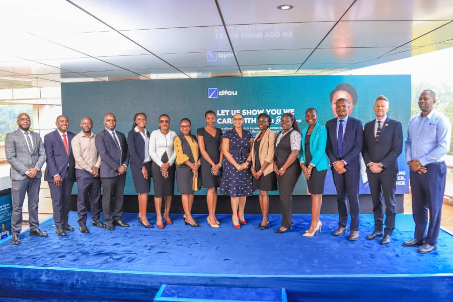 dfcu Bank and Jubilee Health Insurance Executives pose for a group photo during the launch of the dfcu BlueCare Insurance product at dfcu Head Offices in Nakasero.