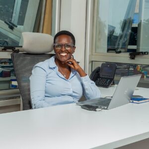 Edna Torana, newly appointed Managing Director of Scanad Uganda, at her office leading the agency’s AI-driven transformation.