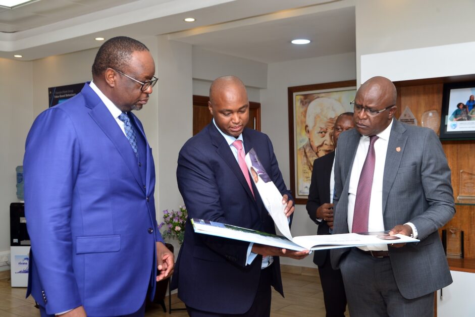 Mumba Kalifungwa during his March 2025 onboarding as Stanbic Bank Uganda Chief Executive with Patrick Mweheire, then Standard Bank East Africa Regional Chief Executive, and Francis Karuhanga, then SUHL Chief Executive.