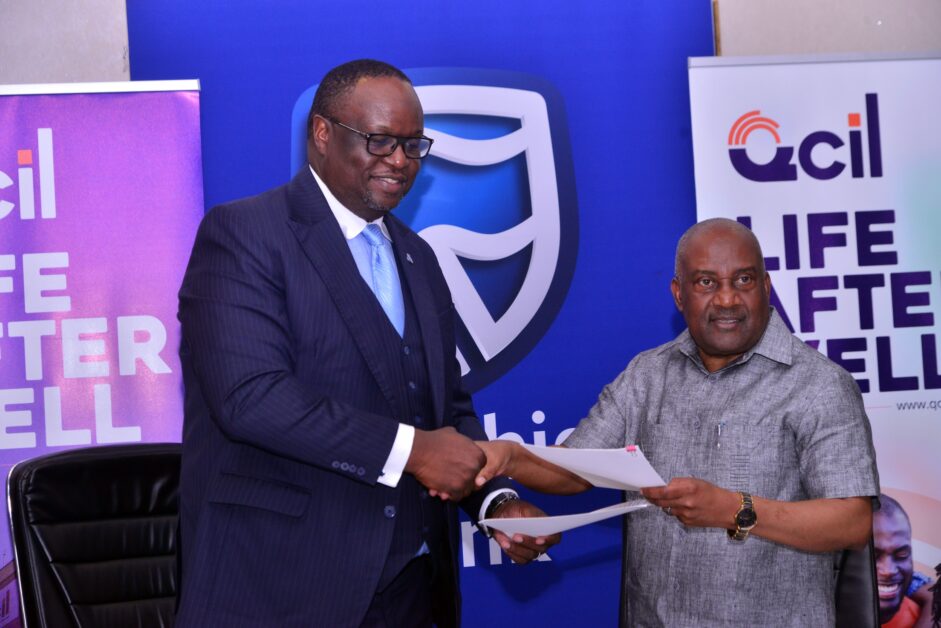 Mumba Kalifungwa, Chief Executive of Stanbic Bank Uganda, and QCIL Chairman Emmanuel Katongole exchange signed documents after formalising a USD 36 million financing agreement in May 2025 — a transaction central to Stanbic’s strategy of converting scale into impact-driven growth.