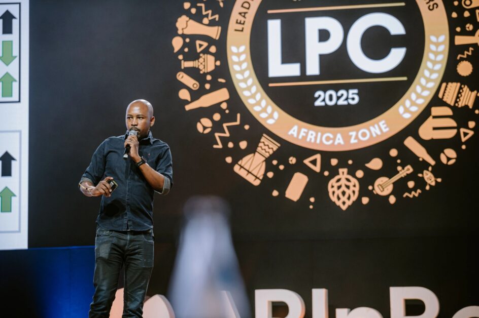 Nkanyiso Mncwabe, incoming Managing Director of Nile Breweries Limited, speaks on stage during AB InBev’s Leadership, Performance & Cheers Conference 2025, ahead of taking over leadership of Uganda’s largest brewer.