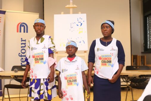 Some of the children supported by the Uganda Child Cancer Foundation pose in the 2026 Childhood Cancer Colour Run kit, embodying the resilience and hope driving this year’s campaign.