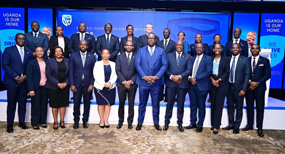 Stanbic Bank Uganda’s leadership team pose for a group photo following the 2025 financial results release at Sheraton Hotel, Kampala—marking a year in which the bank unlocked over UGX 717 billion in new lending, channeling credit into key sectors including manufacturing (UGX 632bn), trade (UGX 598bn), infrastructure (UGX 595bn), agriculture (UGX 425bn), and UGX 1.5 trillion in household lending to drive broad-based economic growth.