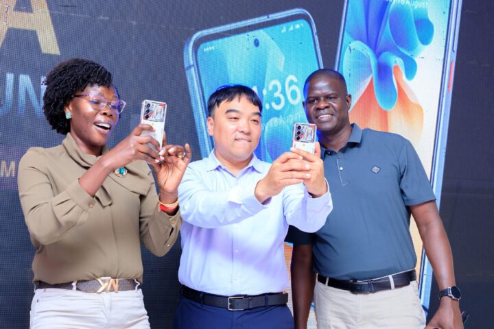 Investment Minister Evelyne Anite and other officials take selfies at the launch of a new SIMI Mobile phone series, reaffirming government support for local device assembly as part of Uganda’s industrialisation agenda. The initiative highlights efforts to boost domestic manufacturing, expand digital access, and position Uganda within regional technology value chains.