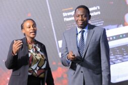 Dr. Michael Atingi-Ego (right) officiates the launch of the Bank of Uganda’s redesigned website alongside Ishta Atukunda, Head of Media Relations, marking a shift toward enhanced digital communication, data accessibility, and real-time public engagement.
